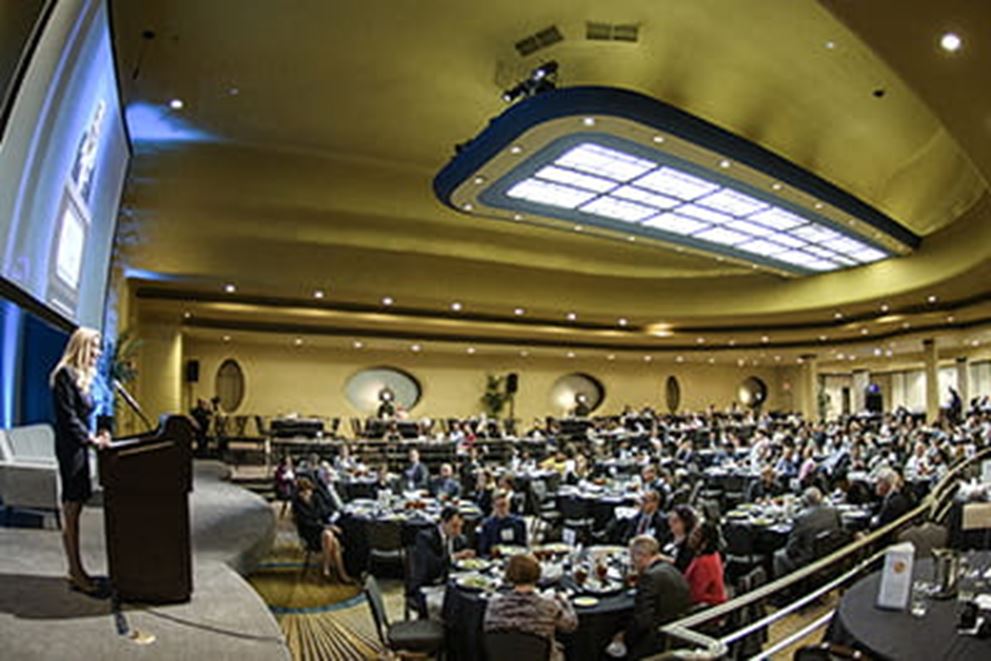 An image of a speaker at a Fed Listens event